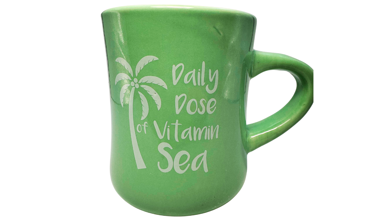 Daily Dose of Vitamin Sea Green Mug with white palm tree and tropical beach phrase