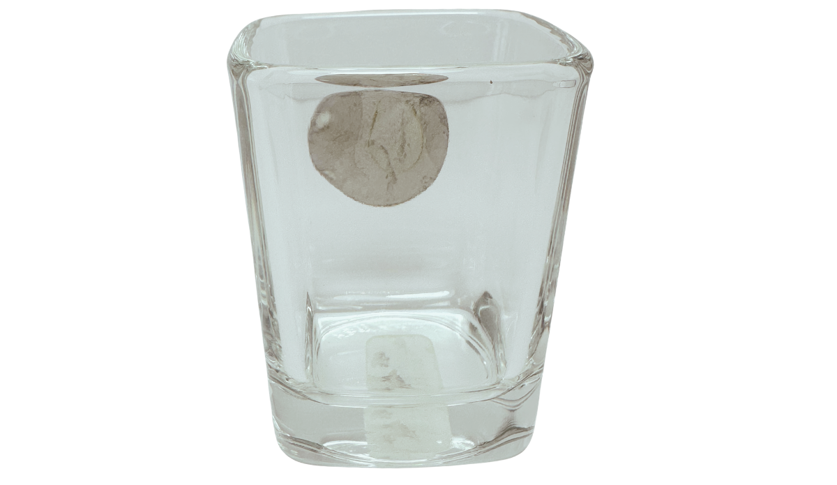 Miami Hurricanes Emblem Shot Glass back view showing reverse of raised circular emblem