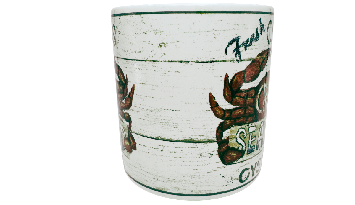 Casa Moda Fresh Clams Crab Mug middle view with distressed white wood look and crab design edges