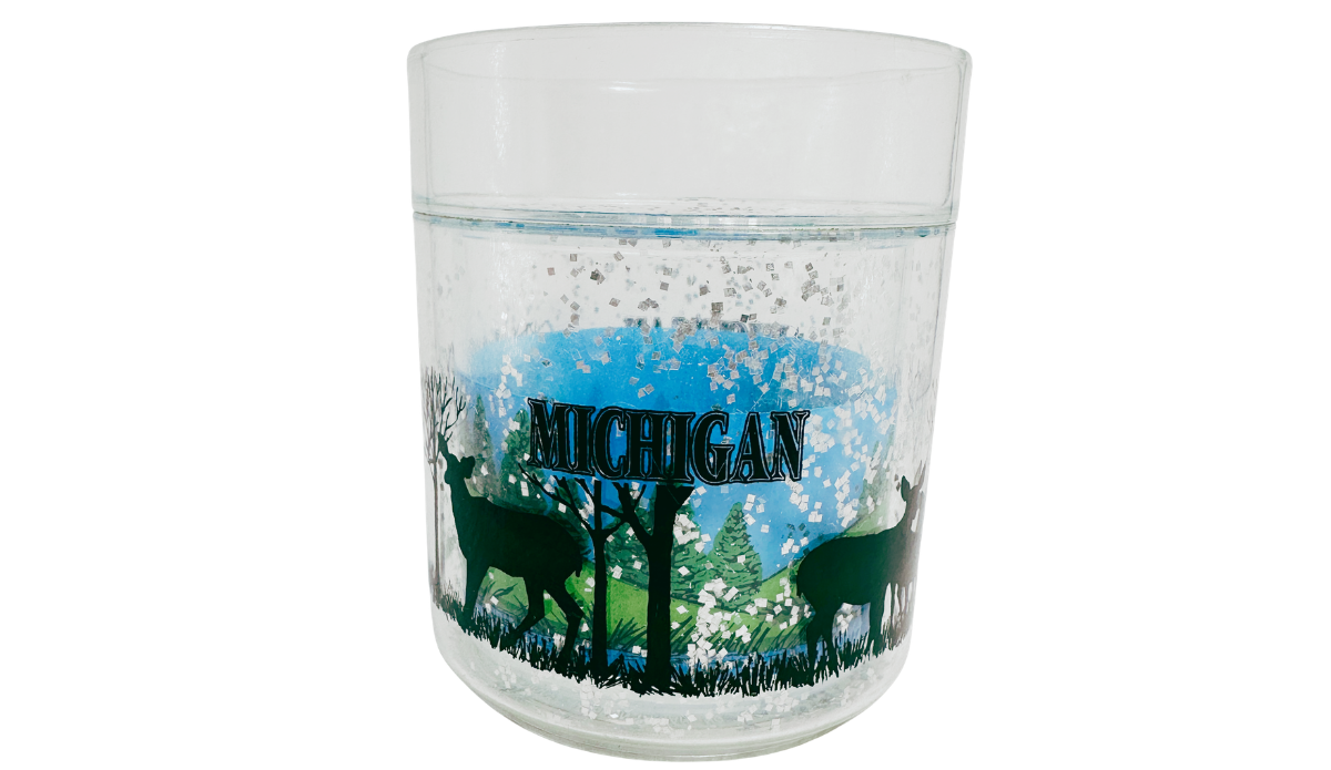 Michigan Deer Glass front view with deer silhouettes, woodland scenery, reflective flecks, and Michigan lettering