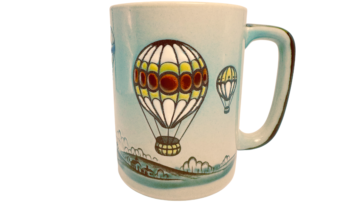 Otagiri Hot Air Balloon Coffee Mug with large colorful balloon over countryside