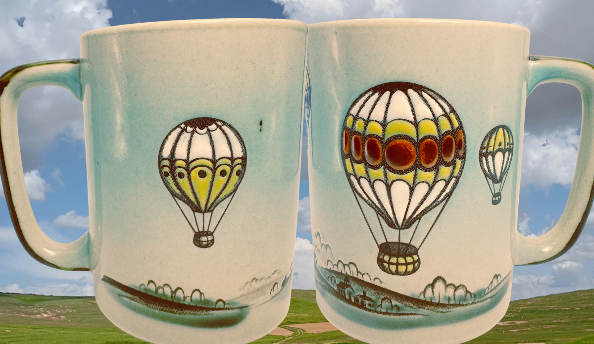 Otagiri Hot Air Balloon Coffee Mug displayed with cloudy sky and open countryside