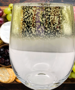 Gold Speckled Ombre Stemless Wine Glass styled with grapes cheese crackers and charcuterie