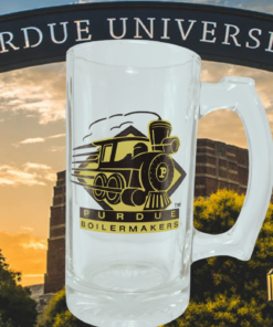 Purdue Boilermakers Train Logo Glass Beer Mug displayed against a Purdue University entrance