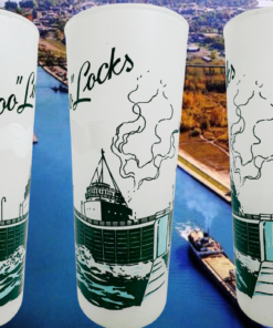 Vintage Soo Locks Glass displayed in multiple views against an aerial Soo Locks waterway scene