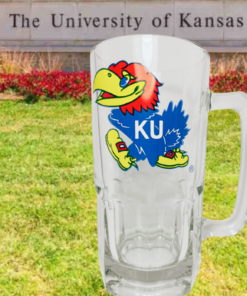 Kansas Jayhawks Glass Beer Mug displayed against a University of Kansas campus backdrop
