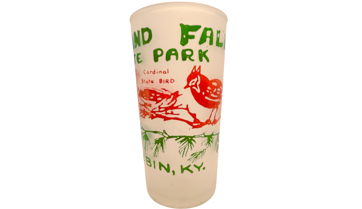 Frosted Cumberland Falls State Park souvenir glass with red cardinal on branch and green lettering