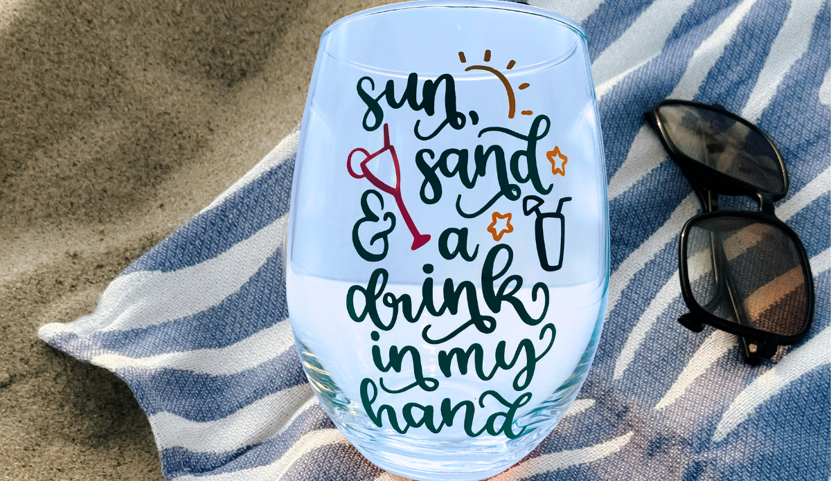 Sun Sand Drink Stemless Wine Glass front view with colorful beach quote and cocktail artwork