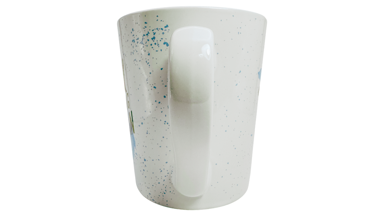 Good Morning Michigan Coffee Mug handle view with white handle and blue speckled finish