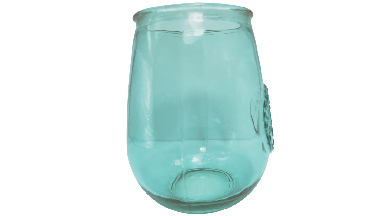 San Miguel teal stemless wine glass with recycled-glass medallion visible along the right edge
