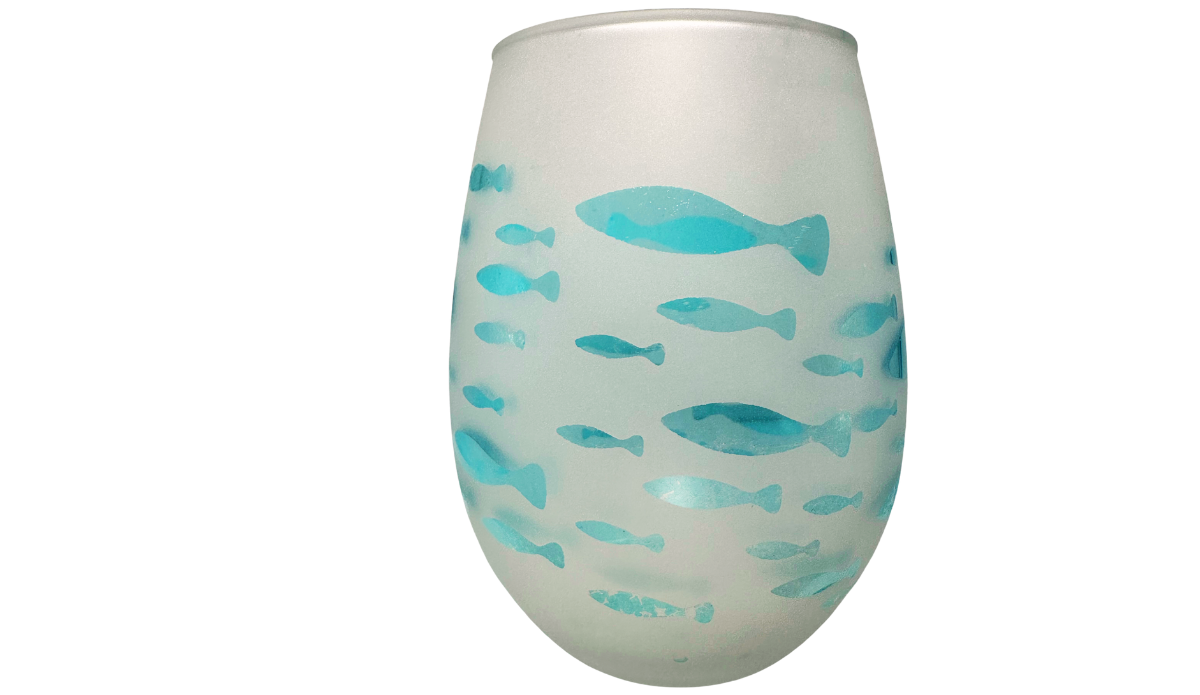Aqua Fish Wine Glass middle view with large and small aqua fish on frosted stemless glass