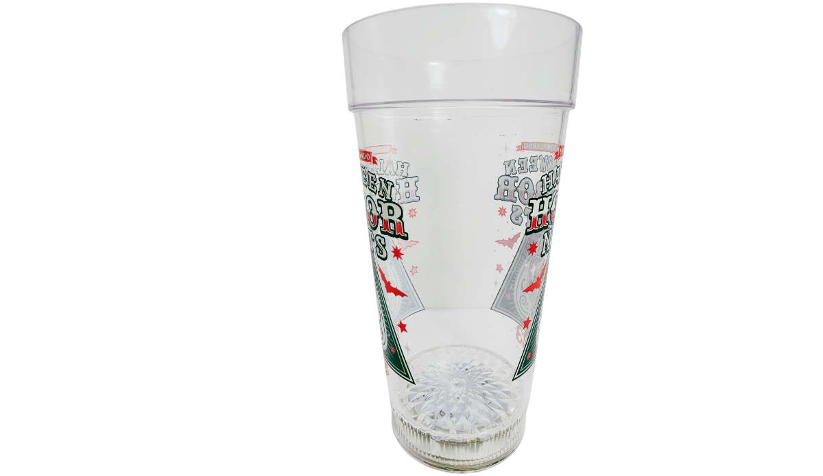 Left side view of Halloween Horror Nights 2023 Cup with partial Universal Orlando graphics and textured base