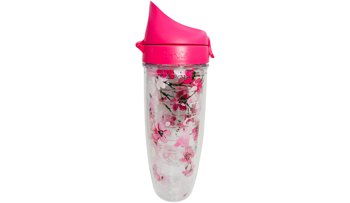Tervis Japanese Cherry Blossom Water Bottle side view showing embossed Tervis logo on coral-pink lid, pink floral artwork and tapered clear body.