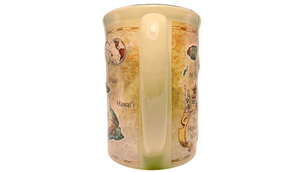 Handle view of Island Heritage Hawaii Map Mug showing the curved cream ceramic handle between two sections of map artwork.