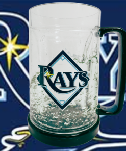 Tampa Bay Rays Freezer Mug lifestyle scene displaying diamond team logo and dark blue handle against enlarged Rays baseball artwork.