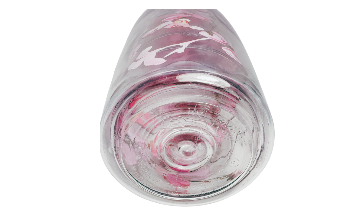Bottom view of Tervis Japanese Cherry Blossom Water Bottle showing molded Tervis logo, manufacturing markings and clear plastic base.