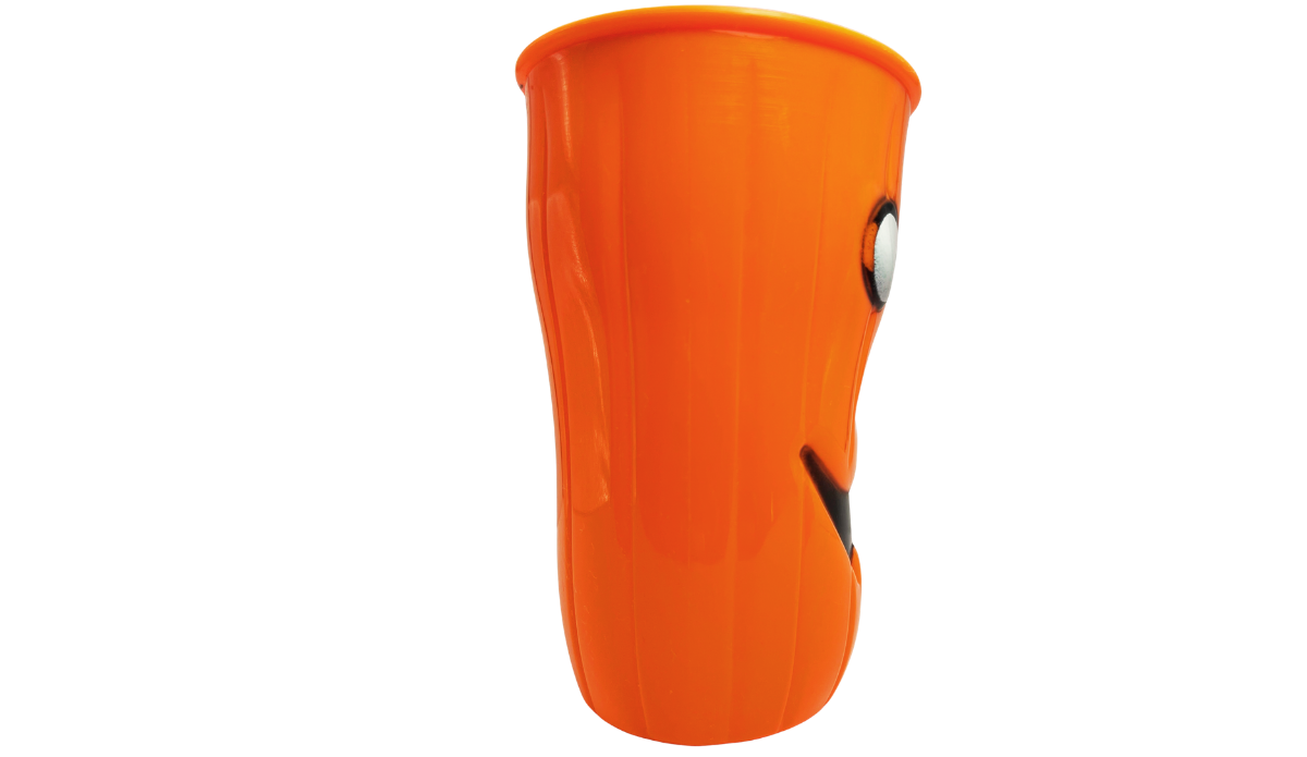 Right side view of 3D Jack-O'-Lantern Halloween Cup showing orange ridged body and partial pumpkin face