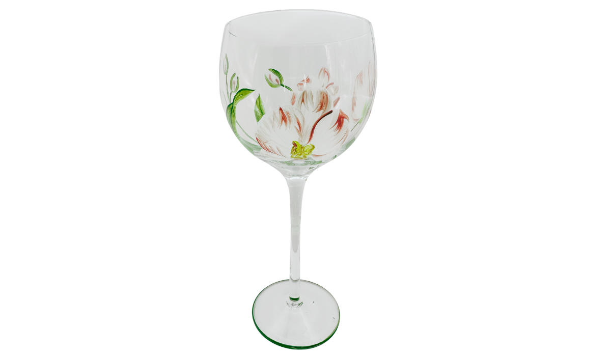Hand Painted Peach Pink Flower Balloon Wine Glass featuring a large creamy white and peach blossom with coral brushstrokes, green center, and botanical leaves.