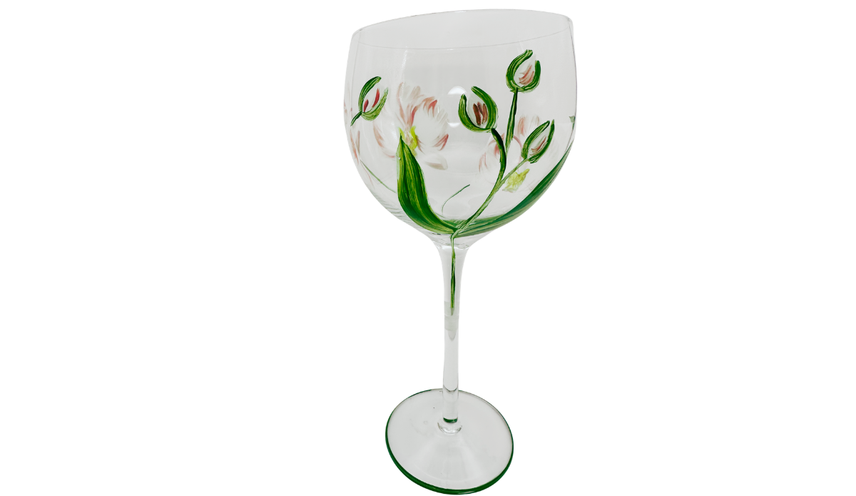Hand Painted Peach Pink Flower Balloon Wine Glass featuring four unopened floral buds, a broad green leaf, and delicate peach-white petals.