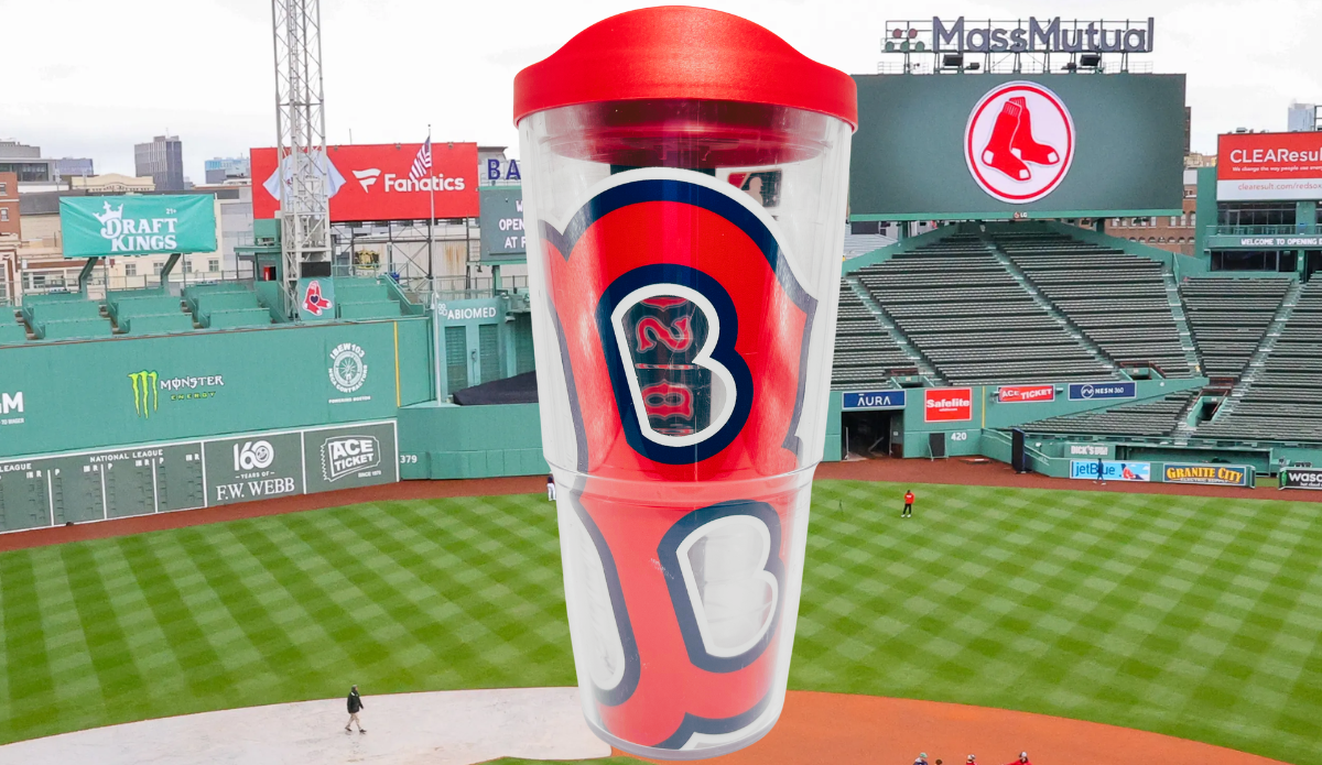 Boston Red Sox Tervis Travel Tumbler displayed against Fenway Park with Green Monster scoreboard and Red Sox signage.