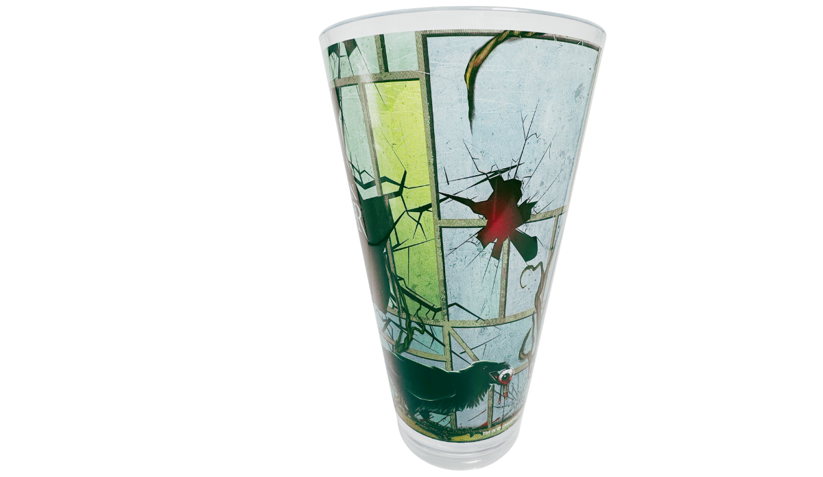 Right side view of HHN 2025 Souvenir Cup with cracked window artwork, dark bird, and twisted branches