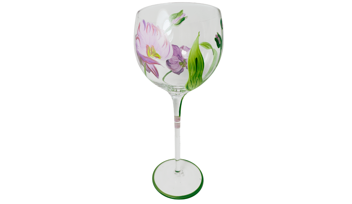Hand Painted Purple Pink Flower Balloon Wine Glass featuring pale lilac blossom, darker purple flower, unopened bud and large pointed green leaf.