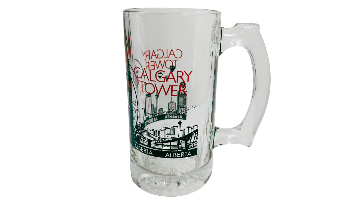 Calgary Tower Beer Mug back view with red Calgary Tower lettering, skyline illustrations, Alberta text, and clear handle
