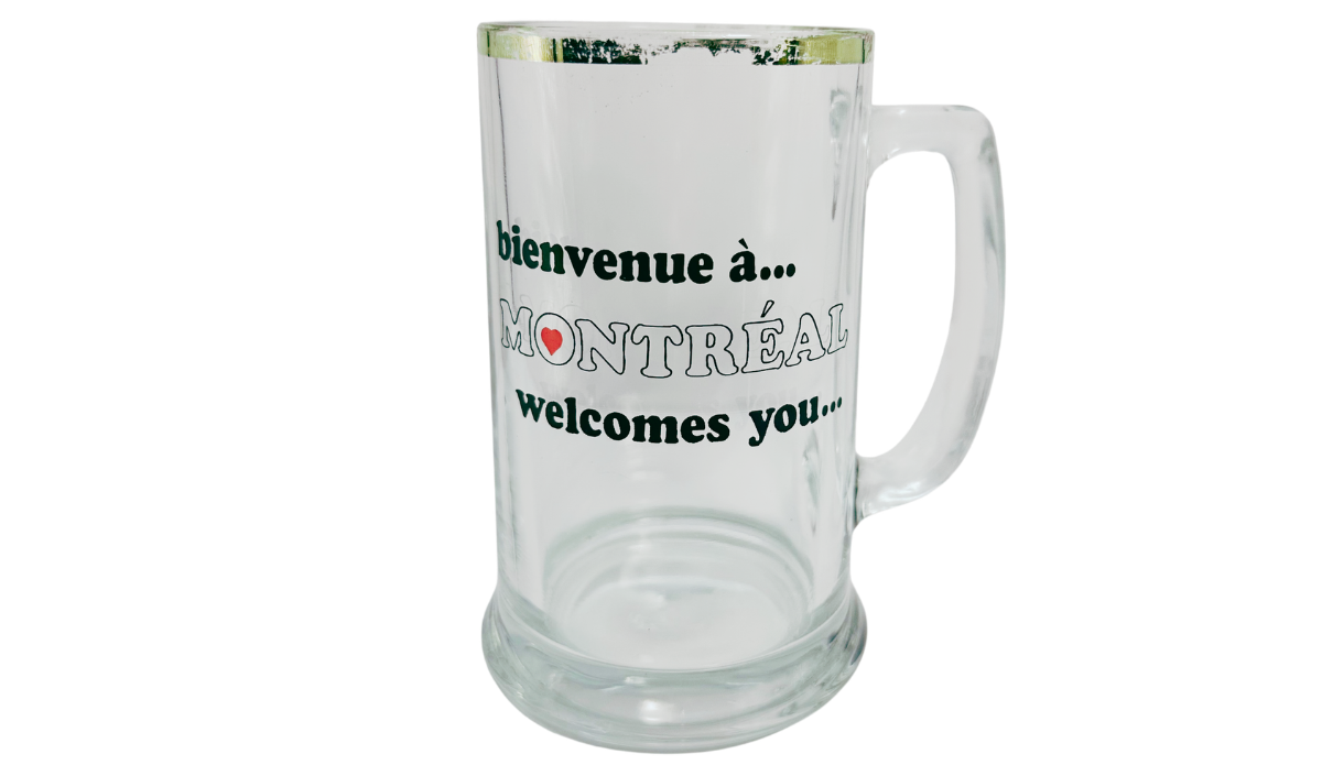 Vintage Montreal Beer Mug front view with bilingual Montreal lettering, red heart detail, clear glass, and gold-tone rim