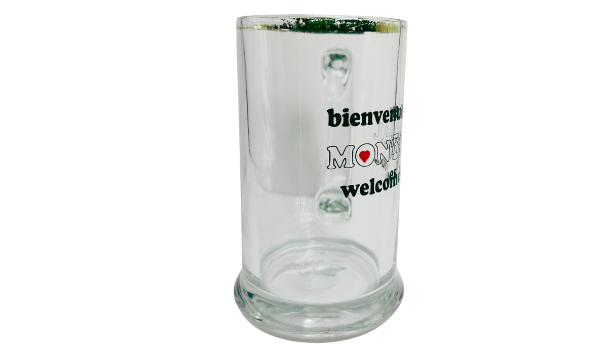 Vintage Montreal Beer Mug middle view with partial bilingual lettering, red heart detail, and gold-tone rim