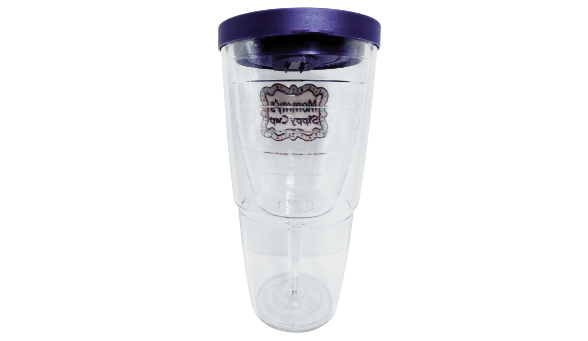 Tervis Mommy's Sippy Cup Tumbler With Lid back view showing reversed pink Mommy's Sippy Cup emblem through transparent walls and deep purple lid.