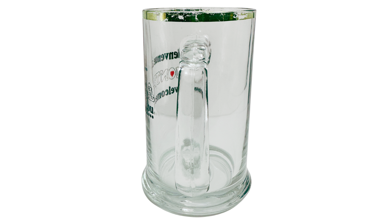 Vintage Montreal Beer Mug handle view with large clear glass handle, gold-tone rim, and partial bilingual artwork