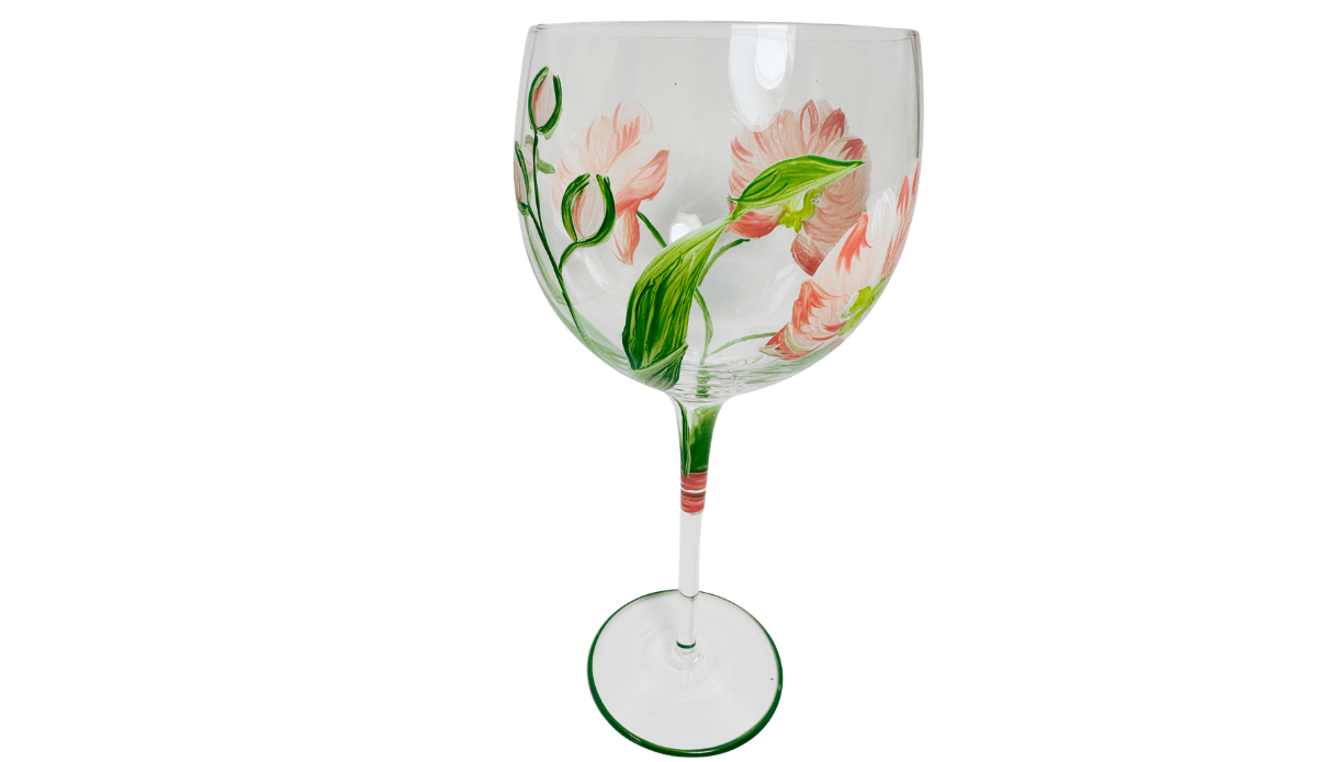 Hand Painted White Pink Flower Balloon Wine Glass featuring broad green leaves, creamy white coral-edged blossoms, unopened buds and painted stem details.