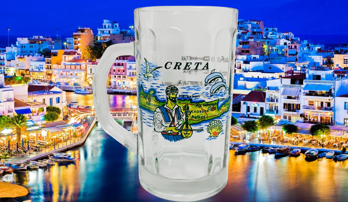 Crete Greece Beer Mug lifestyle scene against colorful Cretan waterfront with boats and illuminated buildings