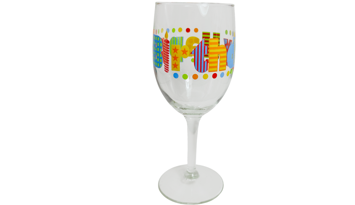 Happy Birthday Colorful Lettering Wine Glass showing large patterned Birthday letters, stars, striped designs, and colorful candles.
