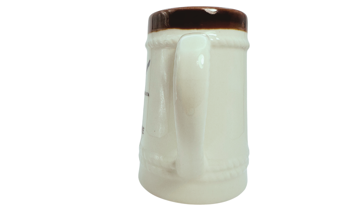 Cyprus Souvenir Beer Stein handle view with cream ceramic body and brown glazed rim