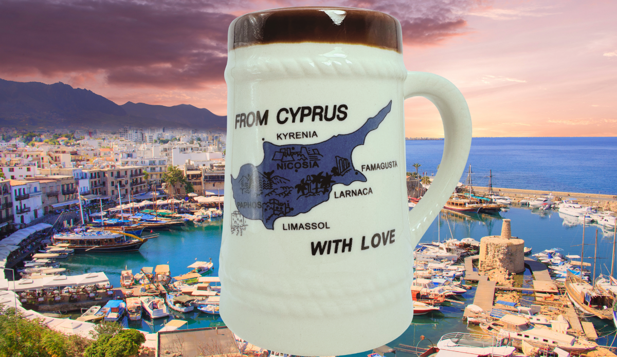 Cyprus Souvenir Beer Stein displayed against scenic Cyprus harbor at sunset