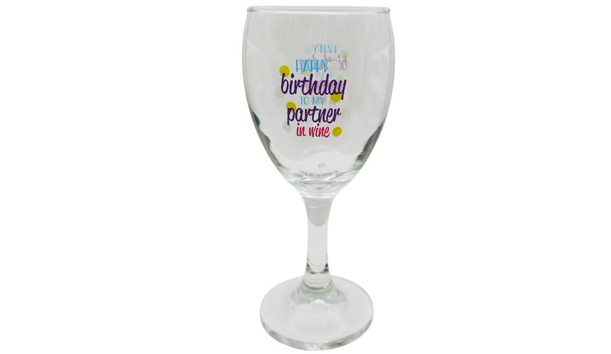 Back view of Happy Birthday Partner In Wine Glass displaying another readable birthday message in turquoise, purple, and pink lettering.