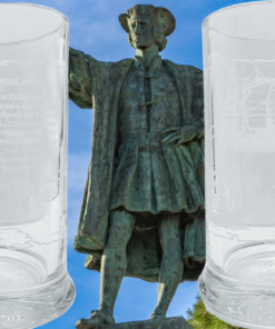 Columbus Voyage Beer Mug shown from two sides beside Christopher Columbus statue