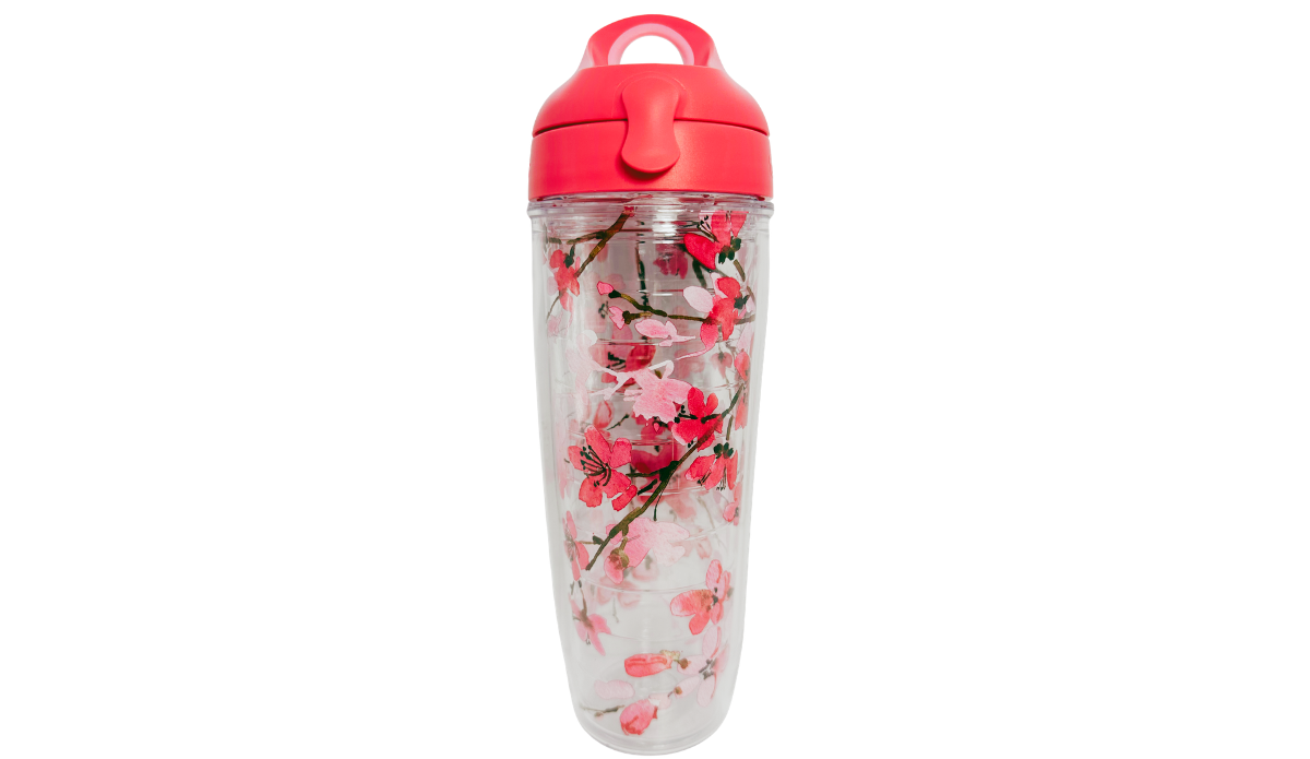 Tervis Japanese Cherry Blossom Water Bottle alternate front view featuring coral and pale pink blossoms, brown branches and bright pink carrying lid.