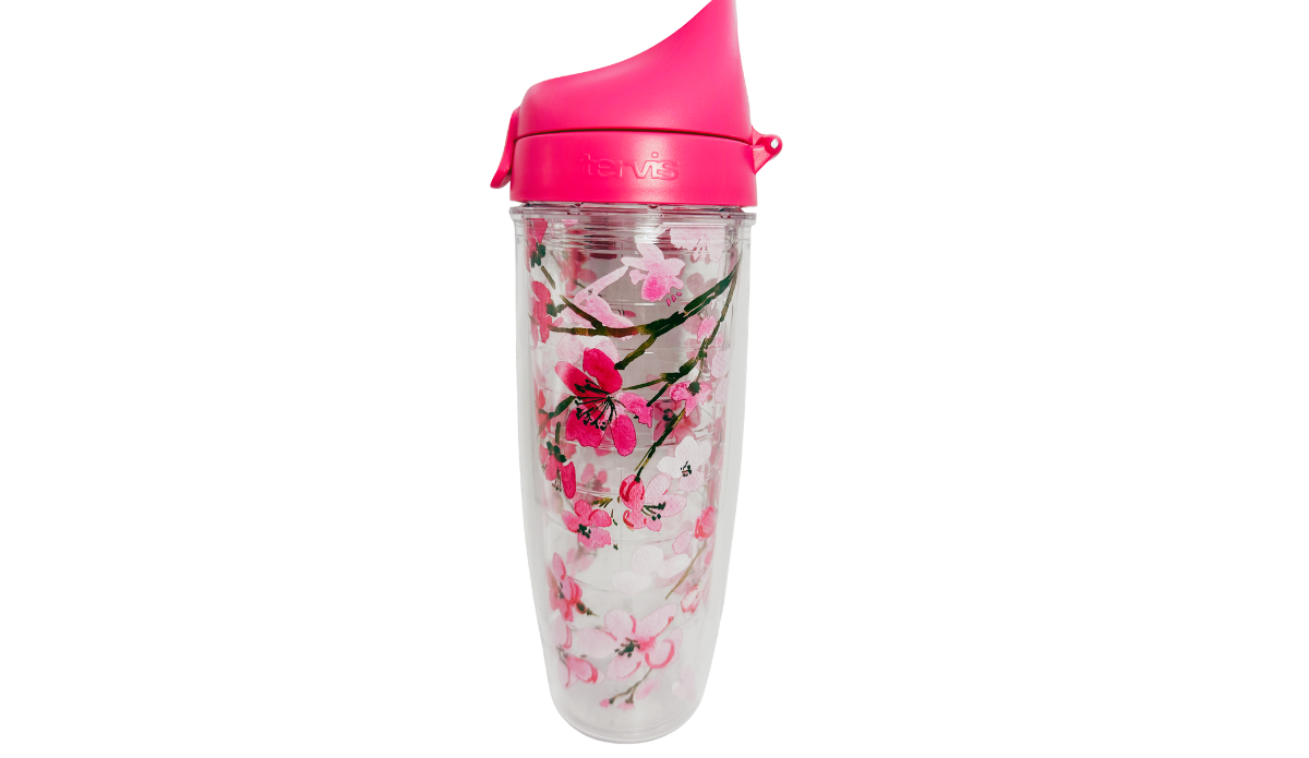 Tervis Japanese Cherry Blossom Water Bottle side view featuring bright pink sakura blossoms, brown branches, embossed Tervis lid branding, and coral-pink flip-top lid.
